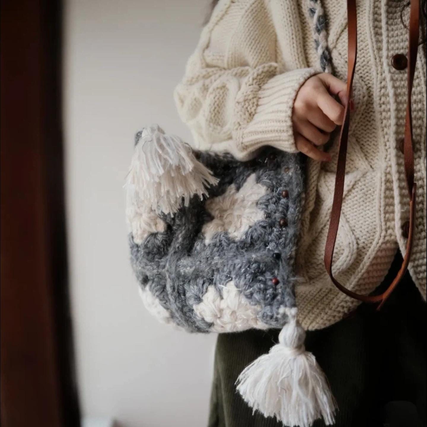 Handmade Boho Dumpling Bag, Colorful Textured Crochet Purse, Chunky Granny Square Tote with Tassels, Artisan Gift for Her